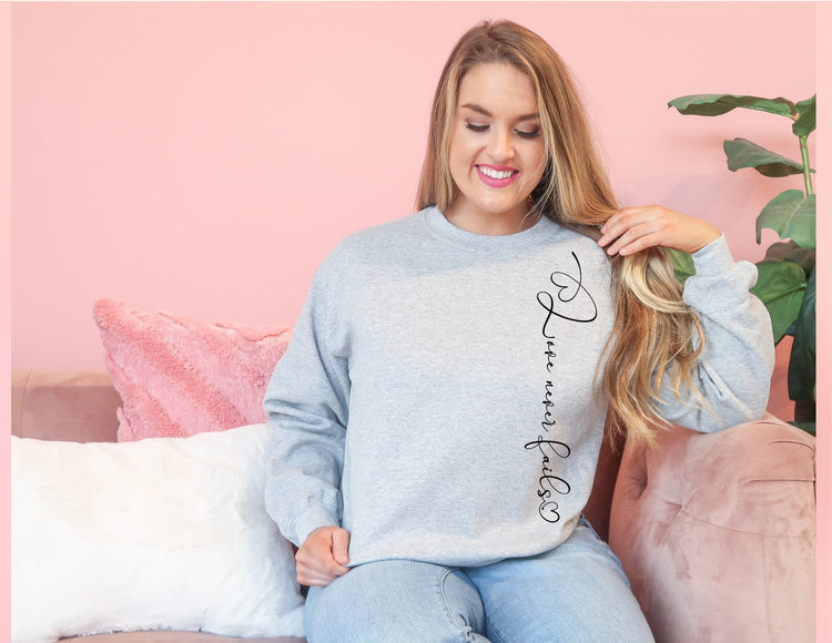 Love Never Fails Sweatshirt